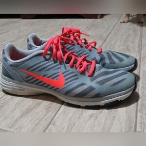 Nike Gray Athletic Sneakers with Bright Coral Swoosh